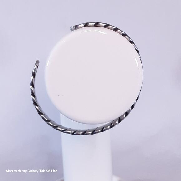 Silver Tone Twisted Cuff Bracelet - Picture 3 of 8